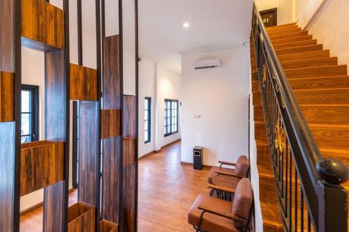 Un lugar para sentarse en RedDoorz at Binjai Deli Serdang