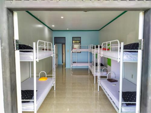 a room with several bunk beds in it at I am Backpacker Hostel in Sabang