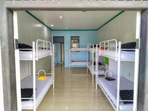 a room with several bunk beds in it at I am Backpacker Hostel in Sabong