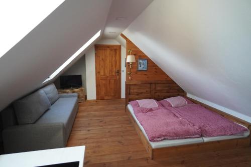 Postel nebo postele na pokoji v ubytování Apartmán Malšín 2