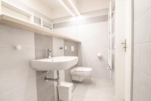 Koupelna v ubytování Garni hotel Roušarka