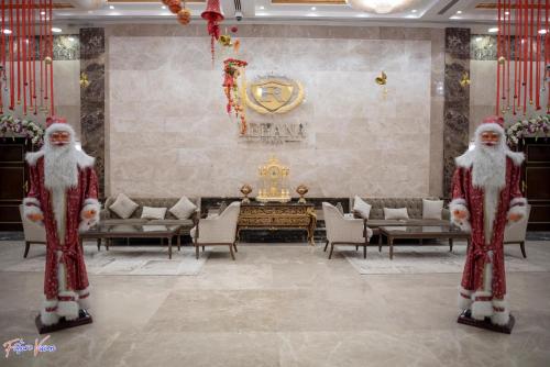 a group of santa claus standing in a room at Rehana Plaza Hotel in Cairo
