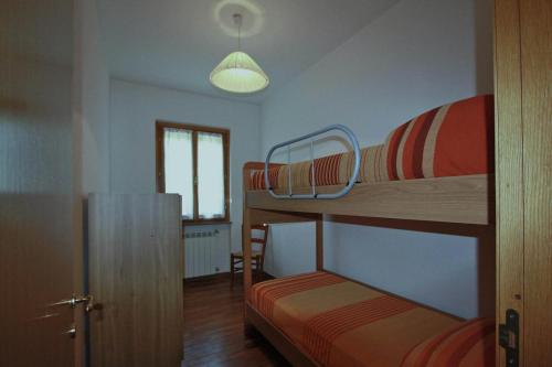 Ένα ή περισσότερα κρεβάτια σε δωμάτιο στο Casale Lucy