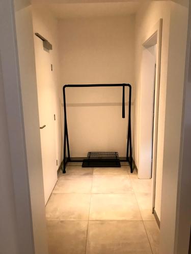 a white room with a soccer goal in the wall at Apart am Waldnerhof in Ried im Oberinntal