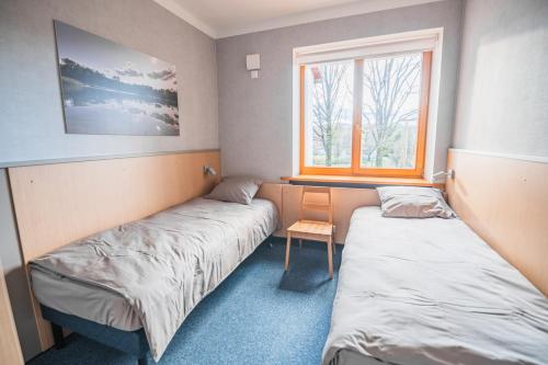 Postel nebo postele na pokoji v ubytování Hostel Sili