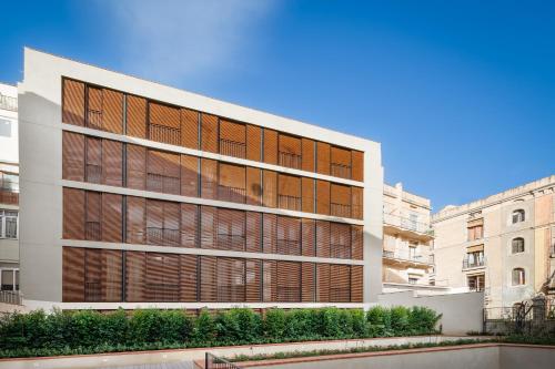 an office building with a lot of windows at Hotel Raval House in Barcelona