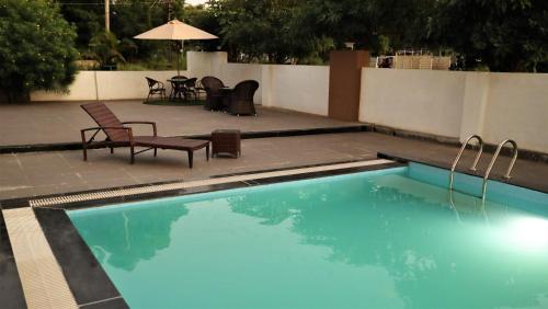 La alberca dentro o cerca de The Fern Residency Parbhani