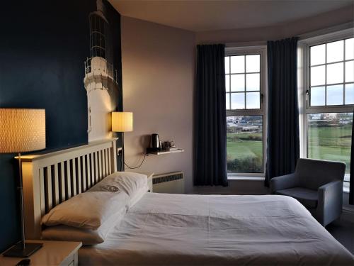 Oceanside Lifestyle Hotelにあるベッド