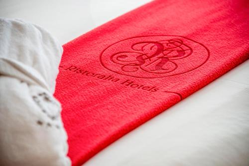 Postel nebo postele na pokoji v ubytování Hotel Grifone