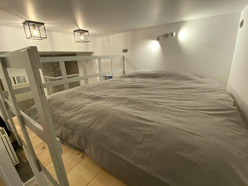Poschodová posteľ alebo postele v izbe v ubytovaní Antwerp West Side