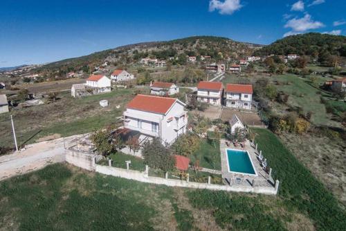 an aerial view of a house with a swimming pool at Villa Lana in Crivac