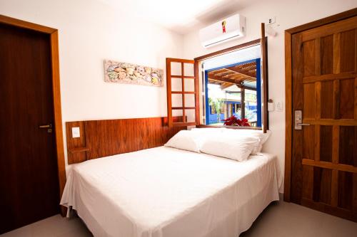 EcoVilla Las Mareas tesisinde bir odada yatak veya yataklar