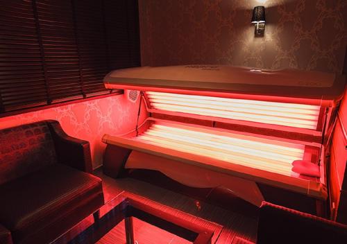 a room with a bench and a sink and a chair at Hotel Feel / Vacation STAY 63700 in Yokohama