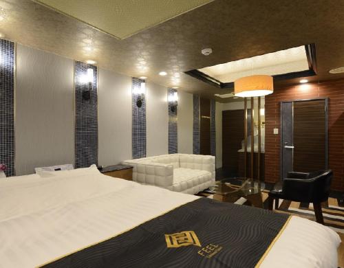 Lova arba lovos apgyvendinimo įstaigoje Hotel Feel / Vacation STAY 63700