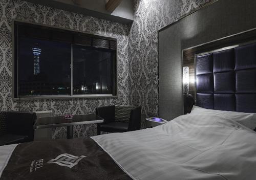 Tempat tidur dalam kamar di Hotel Feel / Vacation STAY 63703