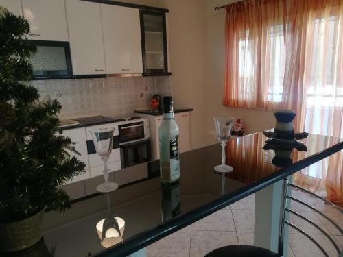 Kuchyň nebo kuchyňský kout v ubytování 2nd Floor Apartment In Volos