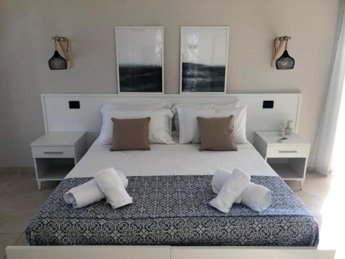 Ένα ή περισσότερα κρεβάτια σε δωμάτιο στο La Rinella