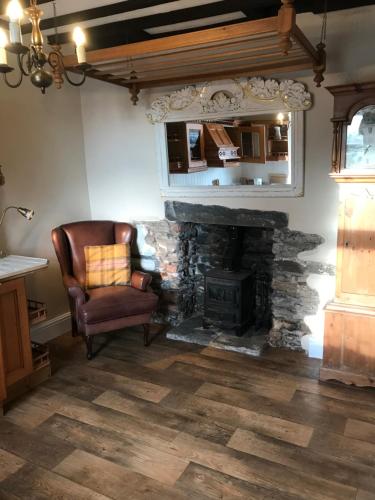 Posezení v ubytování Inglenook Cottage