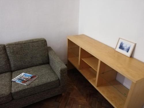 a living room with a couch and a table at Old Town Charm TLN in Tallinn