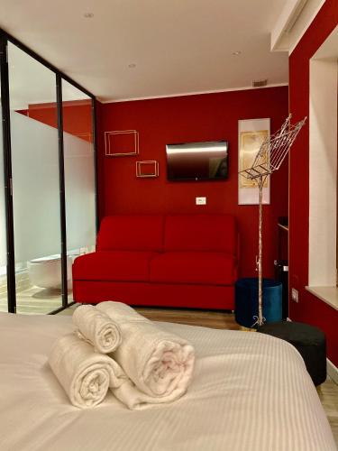 Letto o letti in una camera di Dimora del Teatro