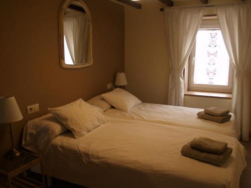 Tempat tidur dalam kamar di Casa acogedora con vistas al mar