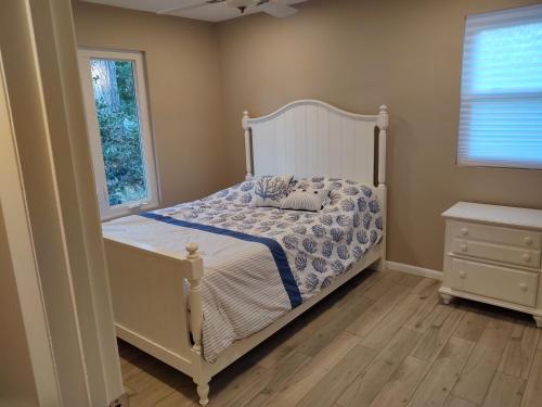 Ένα ή περισσότερα κρεβάτια σε δωμάτιο στο C&D Luvmarshview LLC
