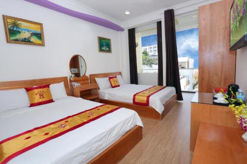 Cama o camas de una habitación en CR Hotel