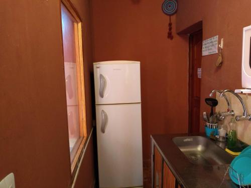Una cocina o zona de cocina en Loma Tika - Tilcara Hostel