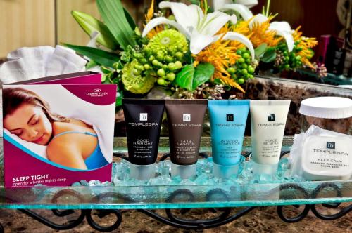 a group of products on a counter with flowers at Crowne Plaza Hotel Portland-Downtown Convention Center by IHG in Portland