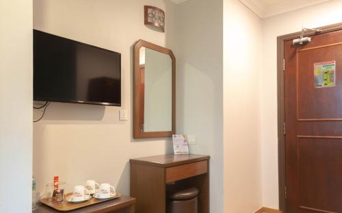 Μια τηλεόραση ή/και κέντρο ψυχαγωγίας στο Hotel Rose Crest Hill, Cameron Highlands