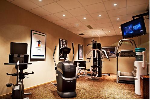 a gym with a treadmill and exercise equipment at Holiday Inn Express & Suites Langley by IHG in Langley