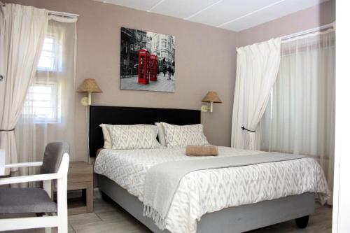 Cama ou camas em um quarto em Amies Self-Catering Apartments