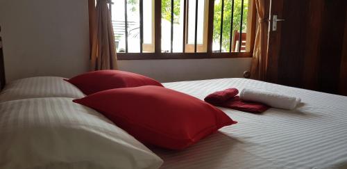 מיטה או מיטות בחדר ב-One More Day Hostel