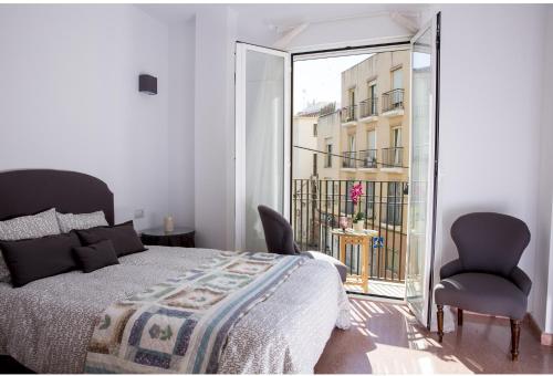 Posteľ alebo postele v izbe v ubytovaní Sea & Wave La Finestra Apartment