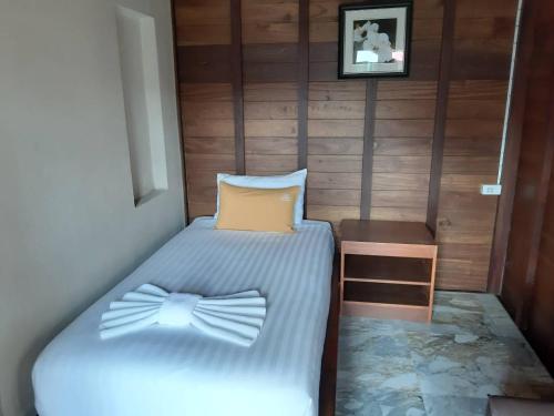 Un ou plusieurs lits dans un hébergement de l'établissement 100 Islands Resort & Spa