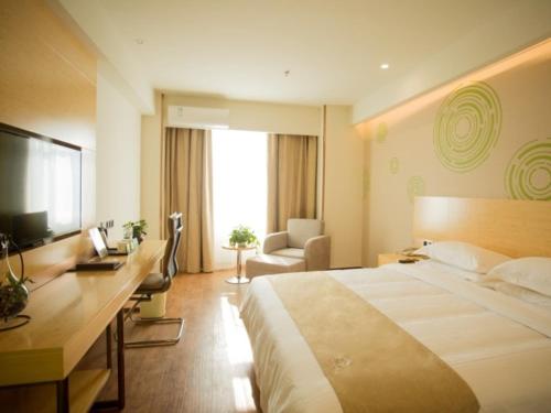 Katil atau katil-katil dalam bilik di GreenTree Inn Jinan Tangye Express Hotel