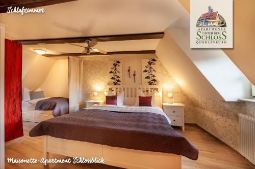 En eller flere senge i et værelse på Apartments Unter Dem Schloß