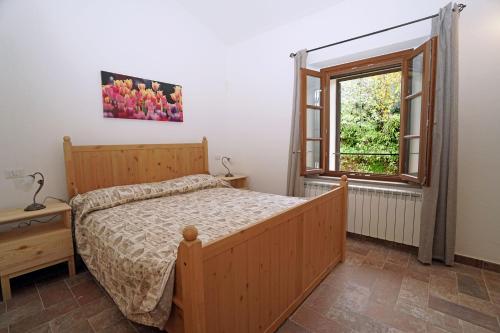 Postel nebo postele na pokoji v ubytování Punta dei Lecci