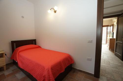 Postel nebo postele na pokoji v ubytování Punta dei Lecci