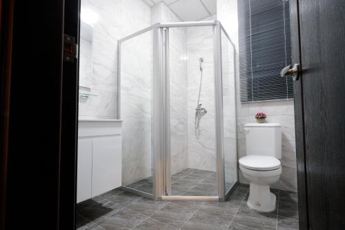 Ein Badezimmer in der Unterkunft Ouxiang Manor Hotel