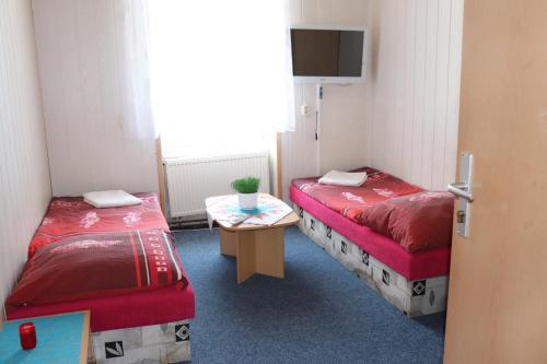 Postel nebo postele na pokoji v ubytování Hotel u Nádraží Lanžhot