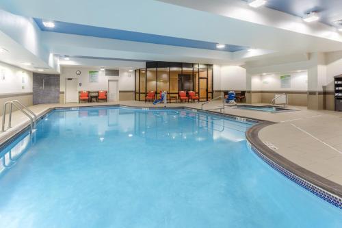 a large swimming pool in a hotel room at Holiday Inn Missoula Downtown by IHG in Missoula