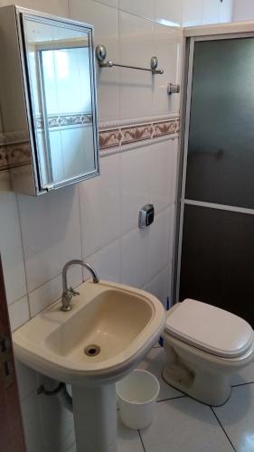 Ett badrum på Amplo Apartamento na Pinheira