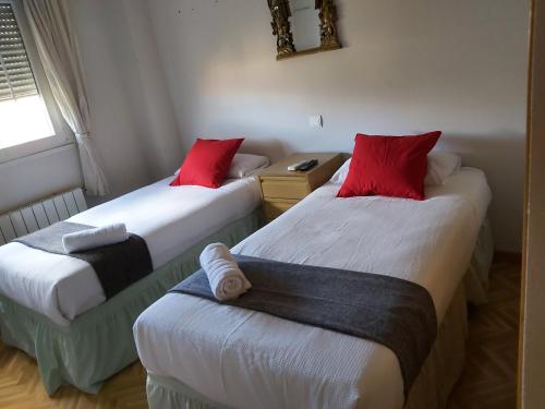 Cama o camas de una habitación en Avila Rooms