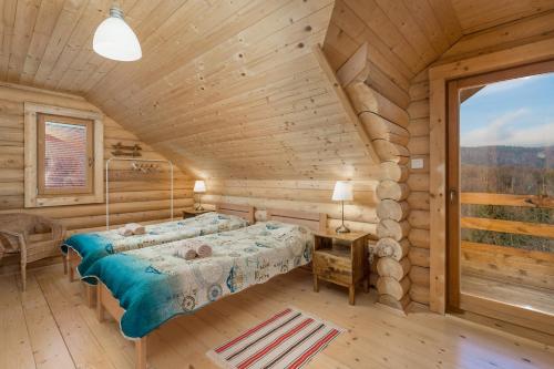 Posteľ alebo postele v izbe v ubytovaní Mountain family home Nola Ivano