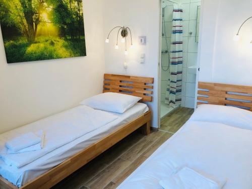 Postel nebo postele na pokoji v ubytování AJO Apartments - Messe City Room - Self-Check-in