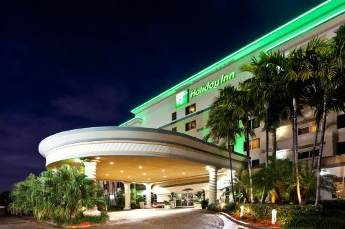 a hotel with a sign on the front of it at Holiday Inn Fort Lauderdale Airport by IHG in Hollywood