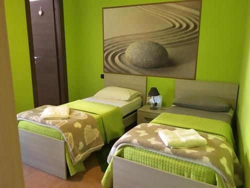Кровать или кровати в номере Al Civico 49
