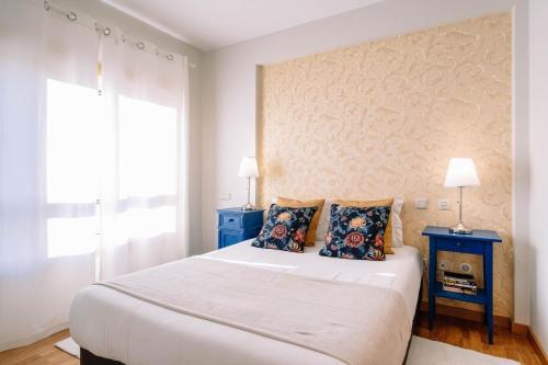 En eller flere senge i et værelse på BBA Apartments Boavista - Casa da Música with Parking