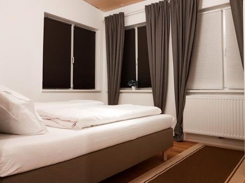 Postel nebo postele na pokoji v ubytování Semmering Loft